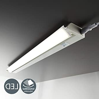 







B.K.Licht - Lámpara fluorescente LED giratoria para armarios y cabinetes, de luz blanca neutra, iluminación bajo mueble con interruptor de luz, 8,5 W, 4000 K, 1000 lm, color blanco






