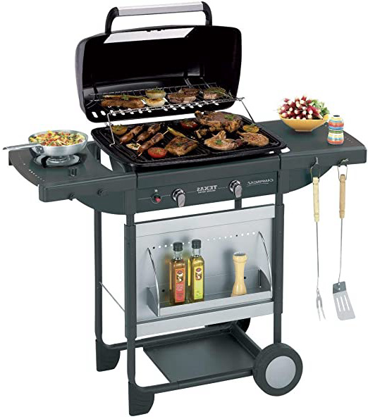 Barbacoa a gas Campingaz para piedra lava Texas Re.volution S, con 2 quemadores de gas compactos, quemador lateral, 8,2 kW de potencia, parrillas de hierro fundido, mesas laterales y carro de acero