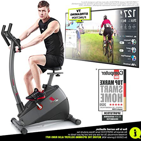 Sportstech ESX500 Bicicleta estática - Marca de Calidad Alemana - Vídeos en Directo y App multijugador + Pantalla de 5,5", Masa de Volante de 12KG, Compatible con pulsómetro - Correa silenciosa
